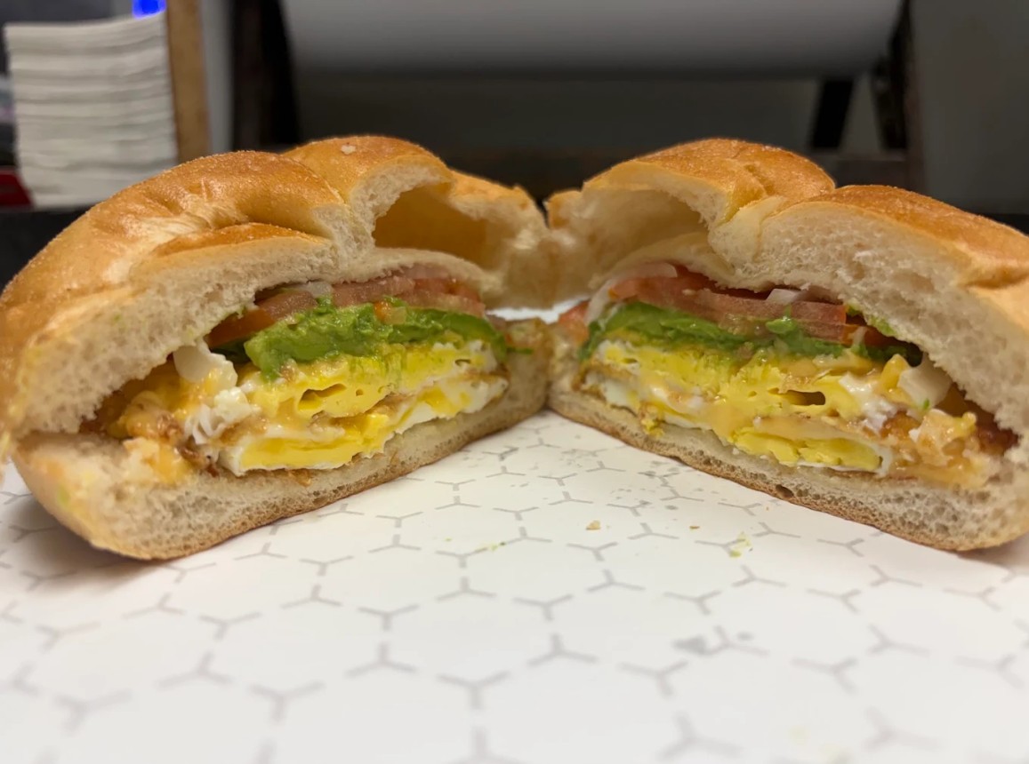 Breakfast sandwich with eggs and avocado at King’s Deli 1
