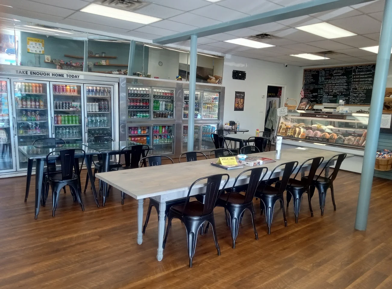Tables and deli counter inside King’s Deli 1